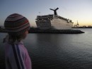 Kara watches a cruise coming in  to Ensenada Harbor