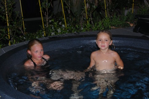 Kara and Lily warming up in the hot tub