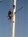 captain Bill up the mast