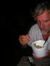 Captain Bill tastes authentic Grenada stew