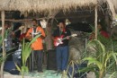 18) The band at the cave was practicing for their evening performance, so we had music with our lunch.  We think the man in black wants to be a Tongan Elvis!  In the evenings, there is a Tongan Feast and dance show inside the cave, but since we were leaving the next morning, we couldn