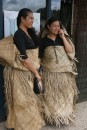 I loved the dicotomy of these girls wearing traditional Tongan mats to show they were in mourning (very traditional) while at the same time using a cell phone!  Many locals wear the woven mats over their clothes as a sign of respect to their heritage, etc..  They are usually just around their waist like an apron.  We were told that the wearing of a full set of mats probably means their father was the one who died.  :(