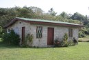 One of the modern houses in the village - very different from the traditional hut.