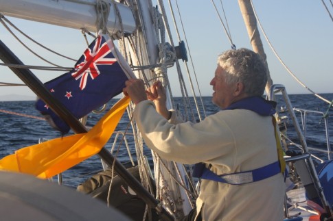 David Raising the NZ and Quarantine Flags