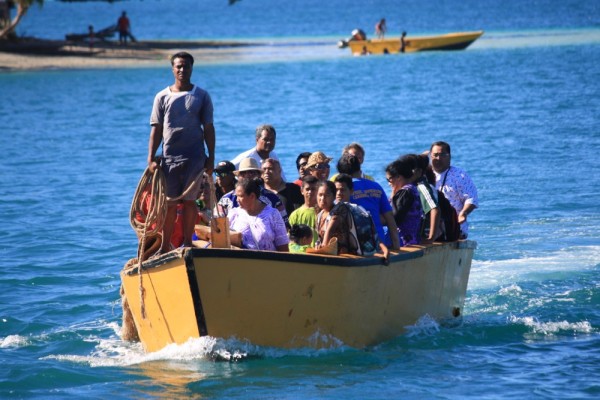 The first boat load of guests being ferried into the lagoon for the 2 week Church of Tuvalu gathering
