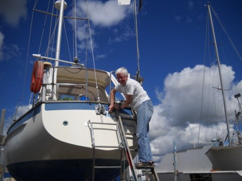 Linda Removing The Old Boat Name And Hailing Port From The Transom