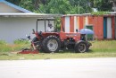 Mowing the sides of the runway in Funafuti