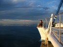 Nat on the bow on a calm, calm day near Double Island - Cairns