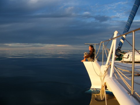 Nat on the bow on a calm, calm day near Double Island - Cairns