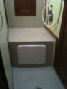 Creating storage in the forward shower, again from unused space..