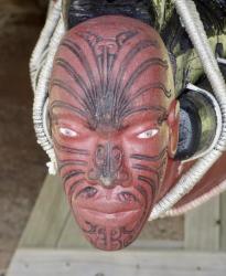Each Waka has a fearsome carved head at the bow