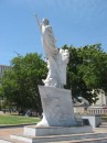 Statue to Immigrants on the riverwalk