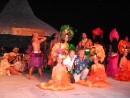 A great show at Papeete, Tahiti, posing with the dance group myself and Reg , one of our guests.: A show at Tahiti, with me and our guest Reg