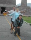 Lindy, Mike and Mary with one foot in the Northern hermishere and one in the Southern in the City of Quito, Equador.
