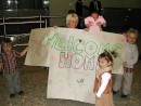Welcome Home: A great home coming welcome from our grandchildren on our arrival at Heathrow airport UK after our flight from Oz.